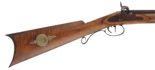 Hawken Rifle,
.54 caliber 35" barrel,
R.E. Davis percussion lock, iron, curly maple,
new, unfired, signed by George Nelson